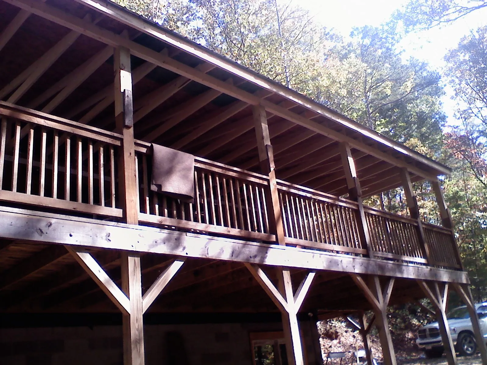 Timber framing under a new elevated porch and deck — Roof Leak Repair in Albemarle by Roofing Brothers